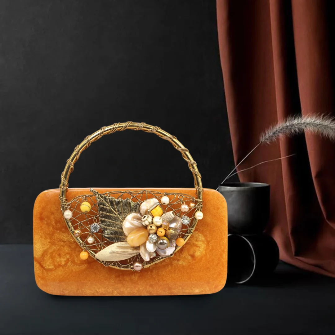 ‎Gilded Amber clutch