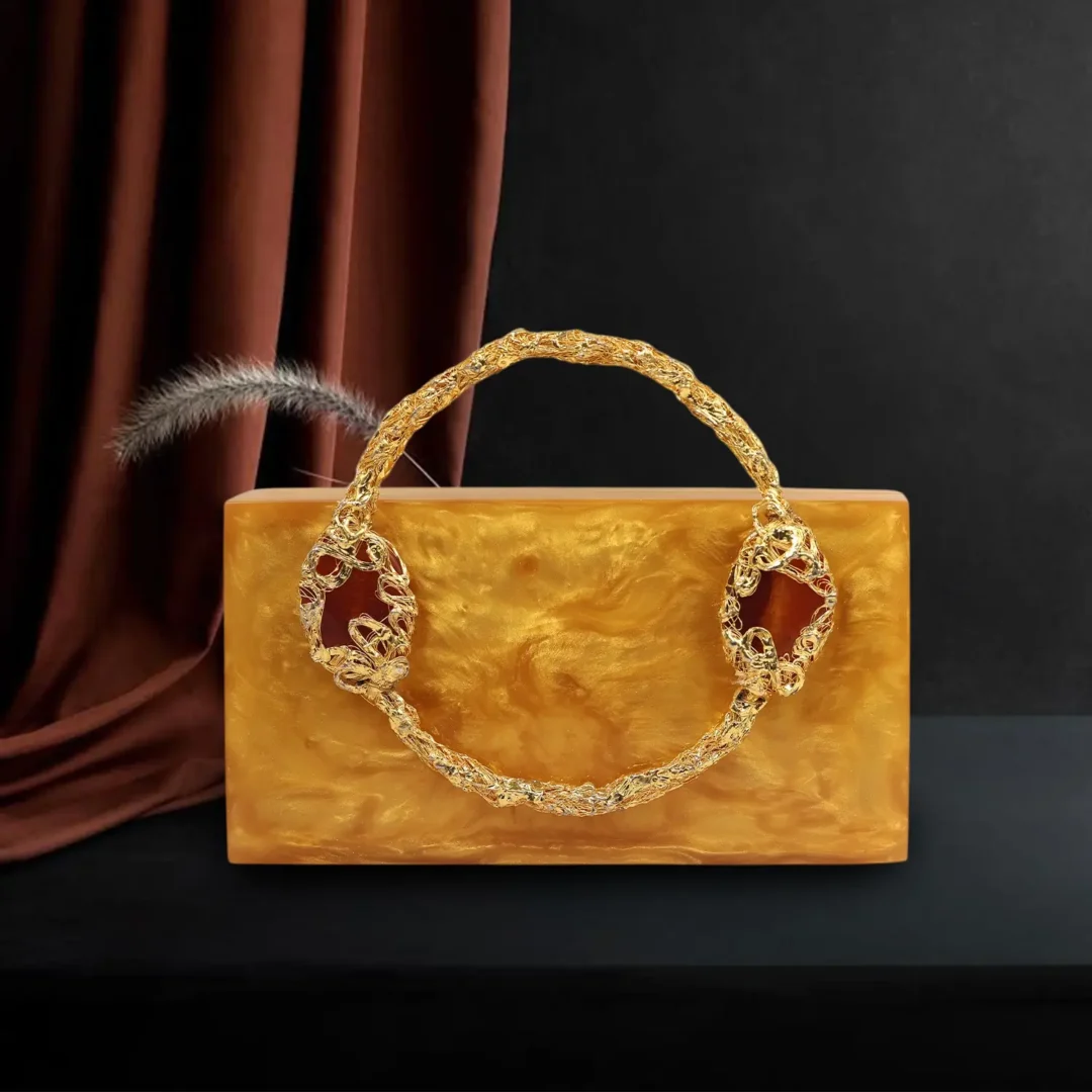 Ornate twisted handle clutch