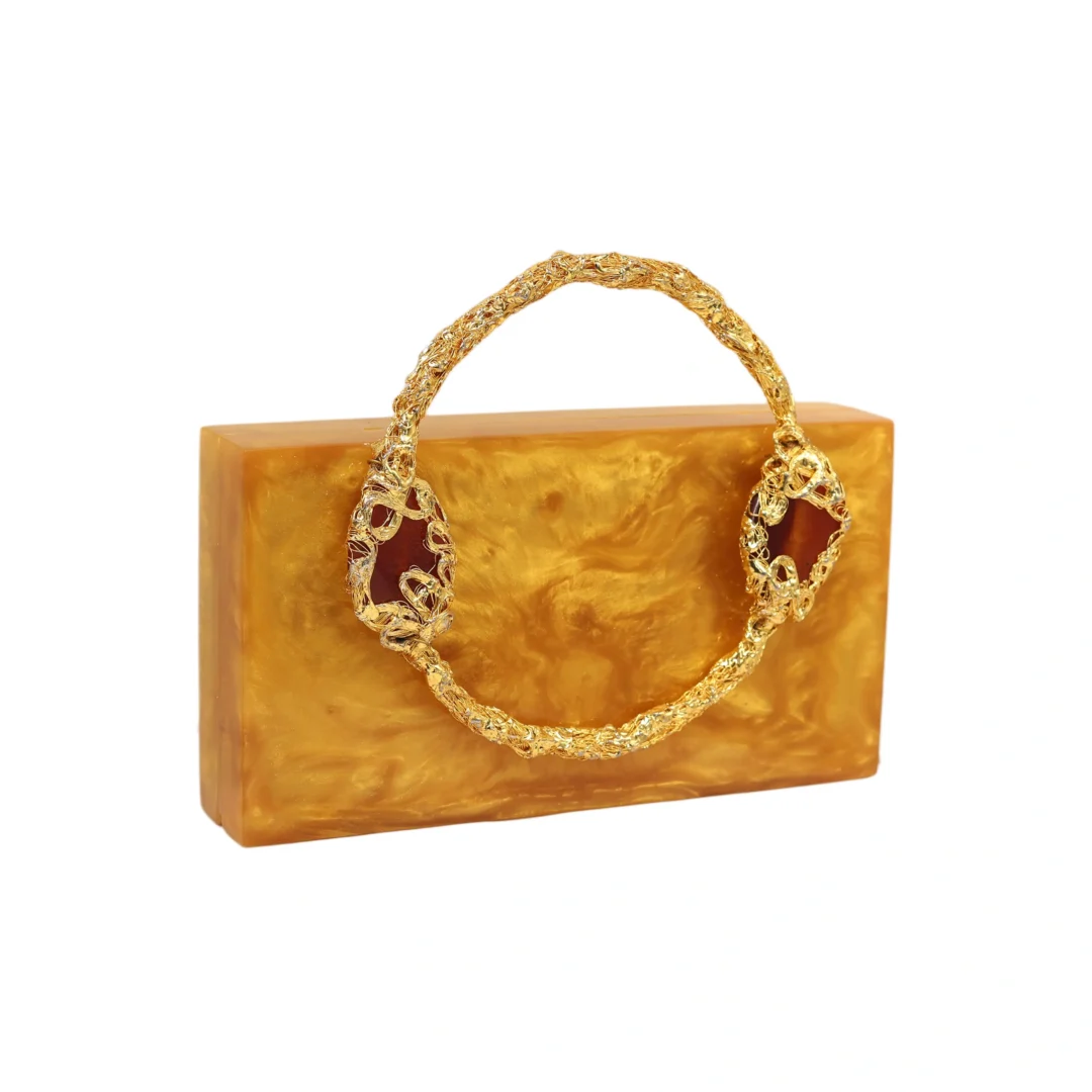Ornate twisted handle clutch