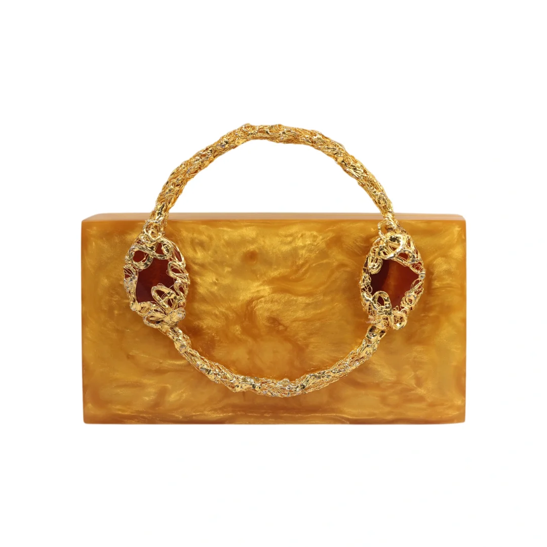 Ornate twisted handle clutch